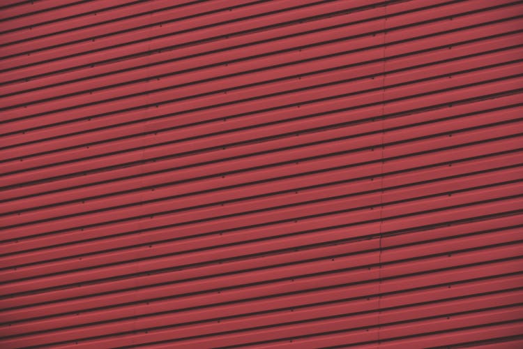 Red Wall Made Of Corrugated Steel