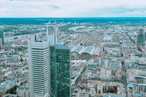 Free Aerial photograph capturing the bustling modern skyline of Frankfurt with skyscrapers and urban architecture. Stock Photo