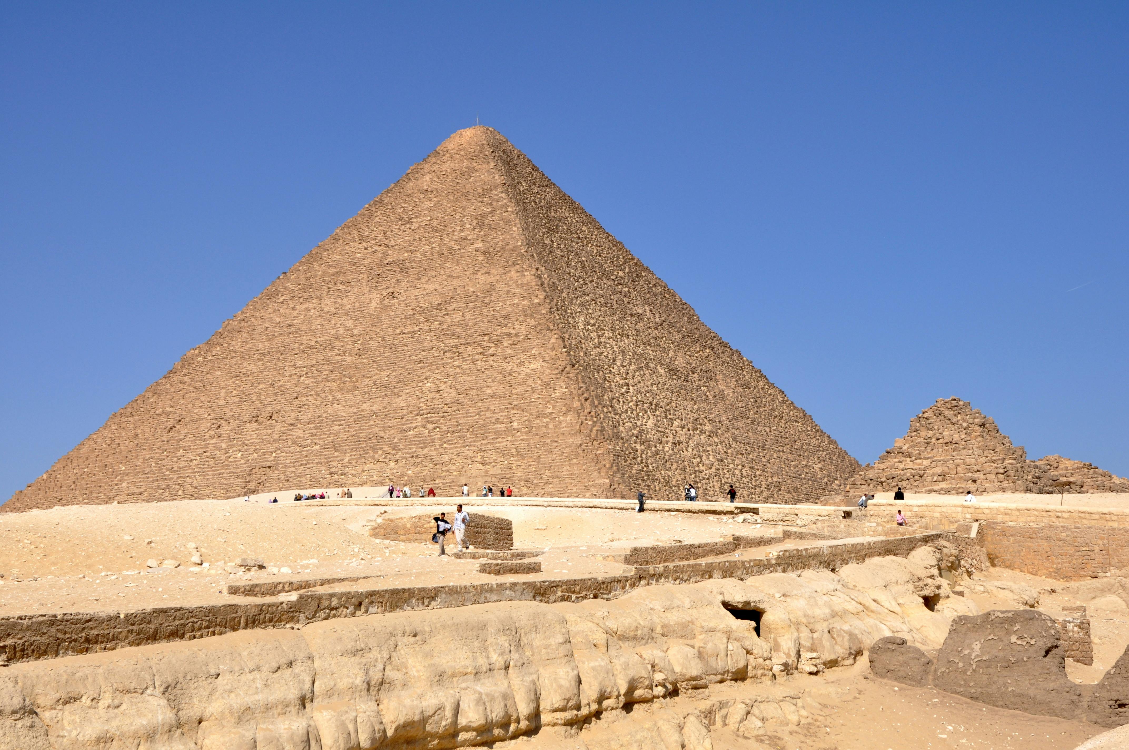 The iconic Great Pyramid of Giza stands tall under a clear blue sky, capturing ancient Egyptian wonder.
