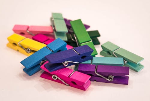 Free stock photo of assorted, back to school, clothespins