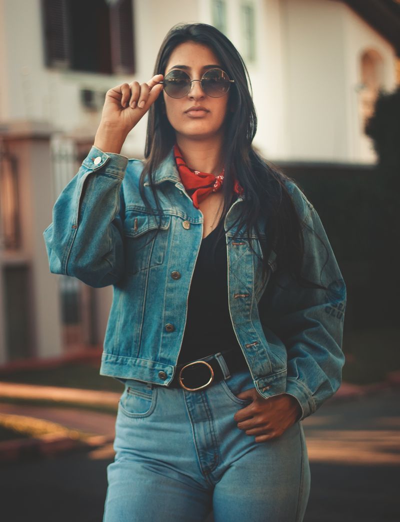 Woman in denim jacket and jeans street style