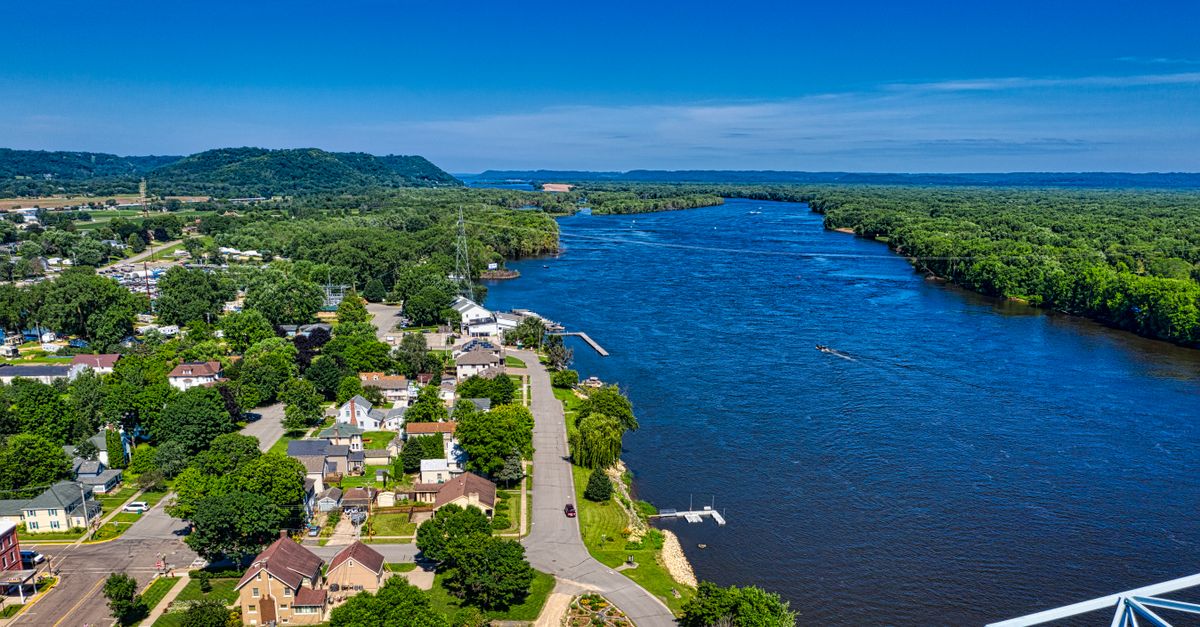 Explore the scenic aerial view of Wabasha, MN by the Mississippi River, showcasing nature and architecture.