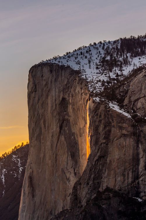 Free Golden hour light on El Capitan in Yosemite, capturing winter's beauty. Stock Photo