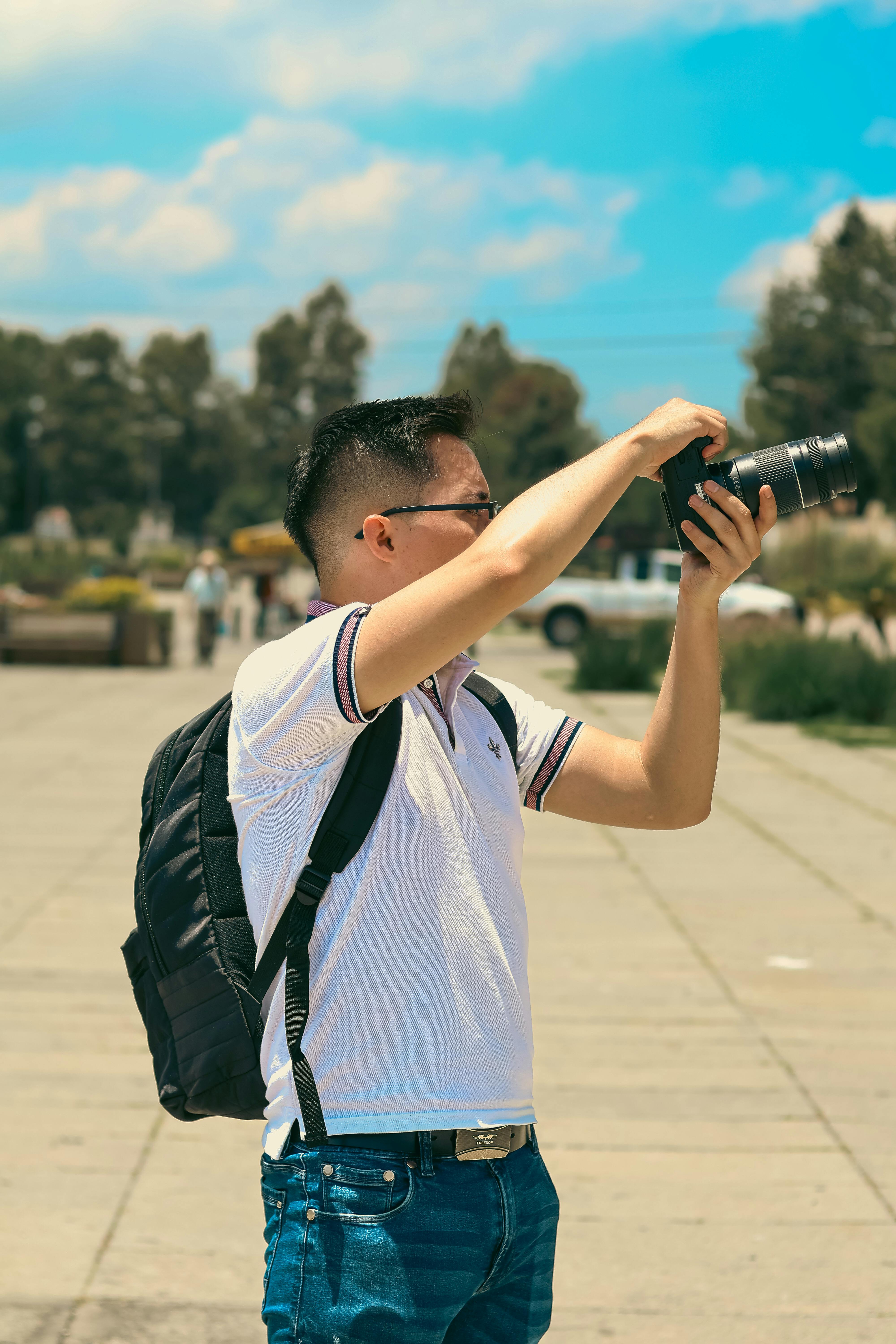 a man taking a picture with a camera