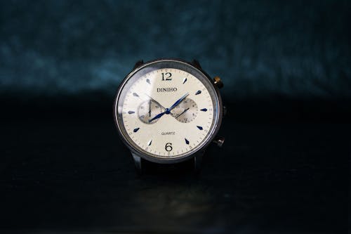 Round Silver-colored and White Chronograph Watch