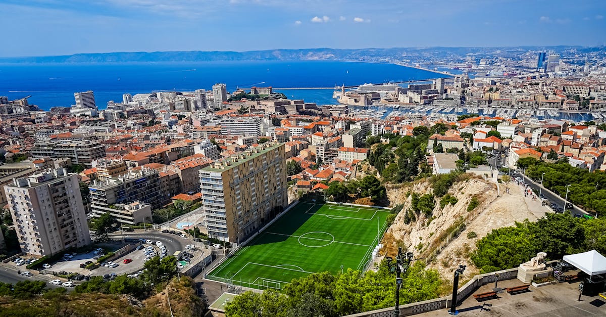 A stunning aerial view of Marseille, France, showcasing the city's skyline and the Mediterranean Sea.