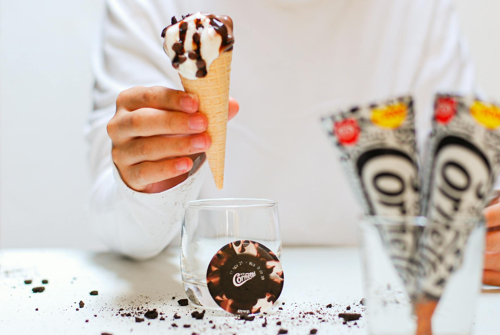 cup, woman, person, test tube, dollar, white, catch, table, liquid, stand, chocolate, hand, close-up, ice cream cone, line, blood, syringe, sky, animal, bottle, skier, tube, treat, pen, ne...