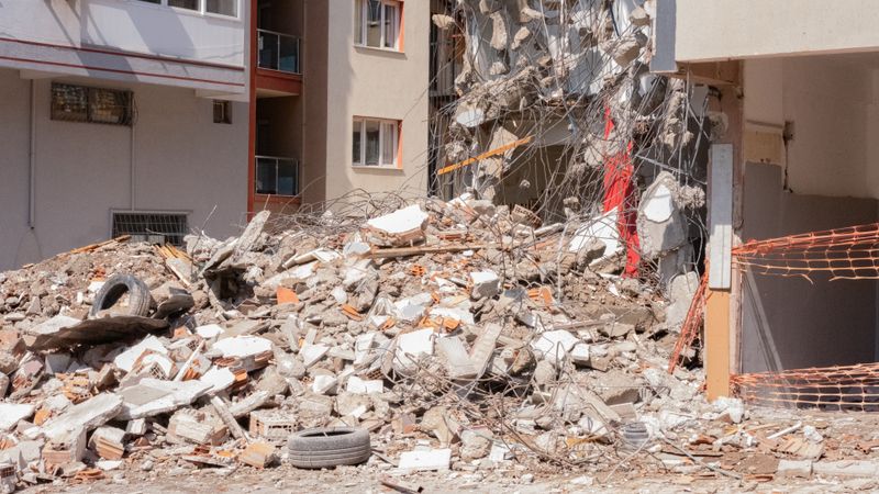 Pile of debris and rubble after demolition in an urban area in İzmir, Türkiye.