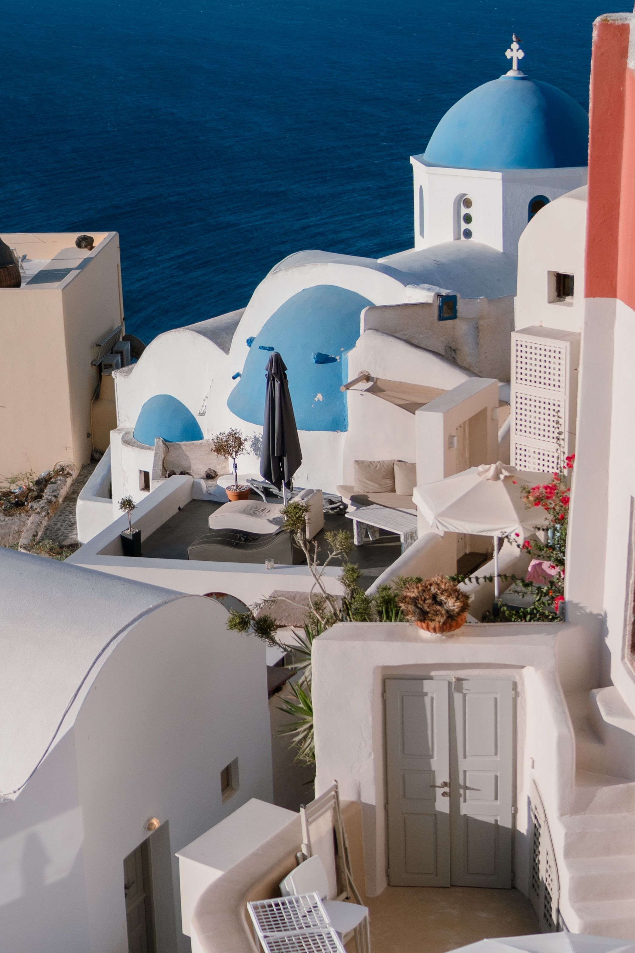 Stunning view of Santorini's iconic white and blue architecture against the Aegean Sea.