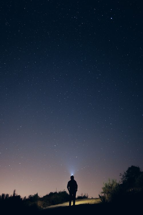 Free A lone silhouette of a man stands under a vibrant starry sky in Şile, İstanbul, showcasing the beauty of the cosmos. Stock Photo
