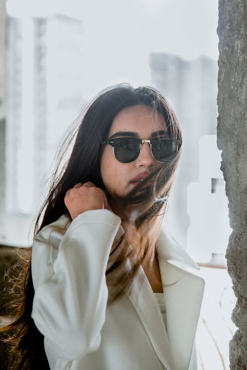 Photo of Woman Wearing Sunglasses