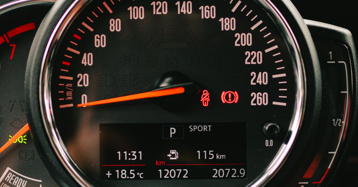 Spedometer Loading Screen A close up of a dashboard with a speedometer · Free Stock Photo