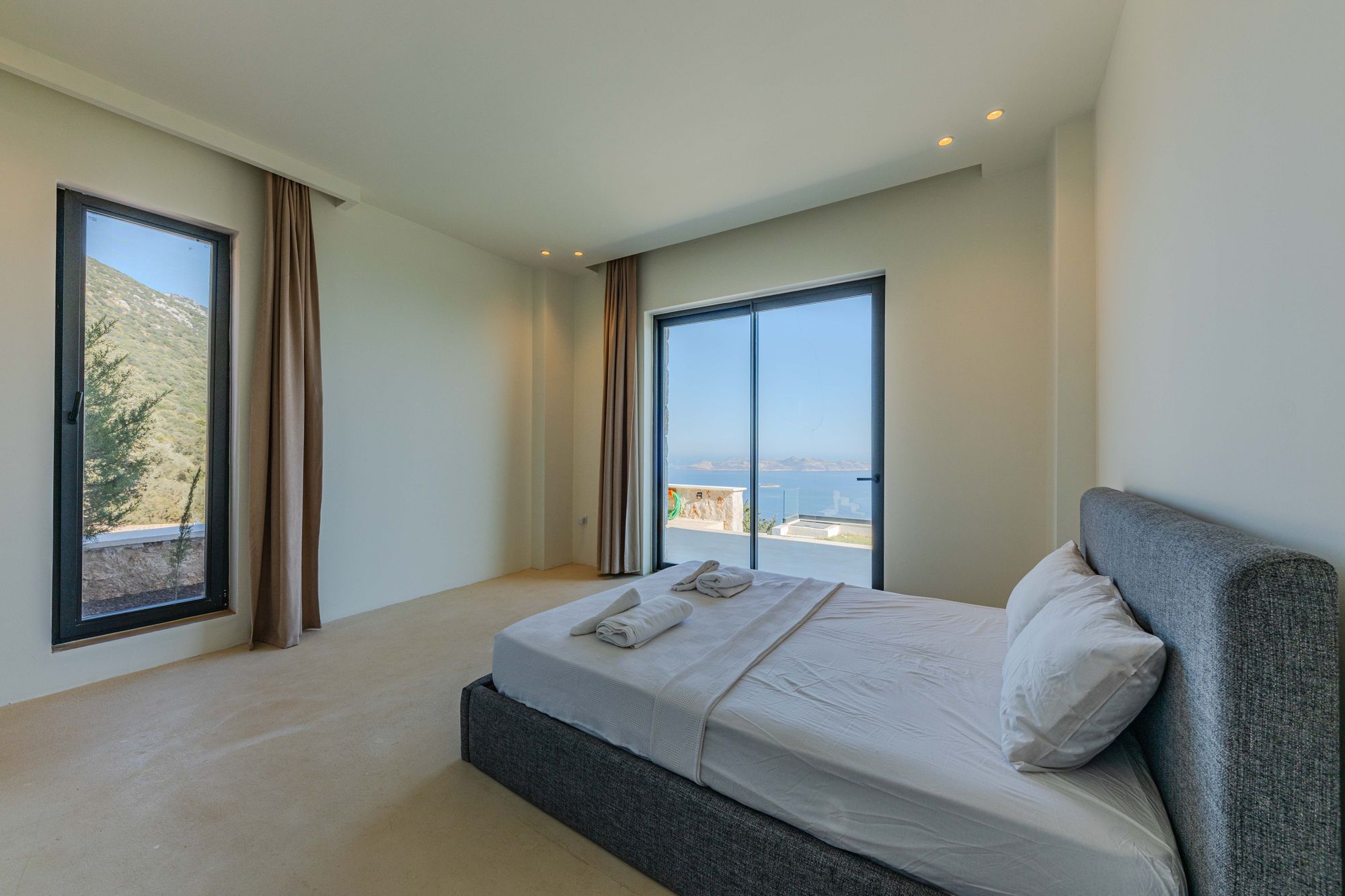 Light-filled bedroom with an ocean-facing view