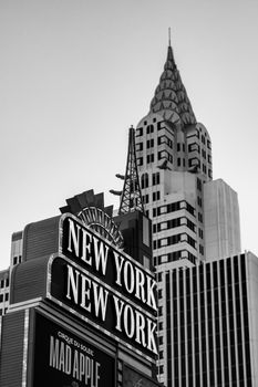 Monochrome view of iconic New York New York sign in Las Vegas, featuring recognizable architecture.
