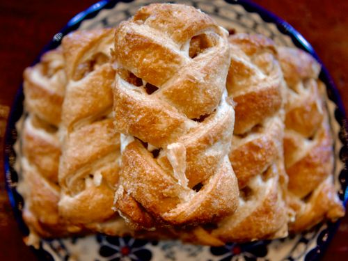 Free Delicious freshly baked lattice pastries with a golden, flaky texture on a decorative plate. Stock Photo
