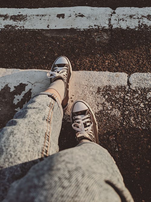 Converse All Star Low Top Sneakers On Brown Wooden Surface · Free Stock ...