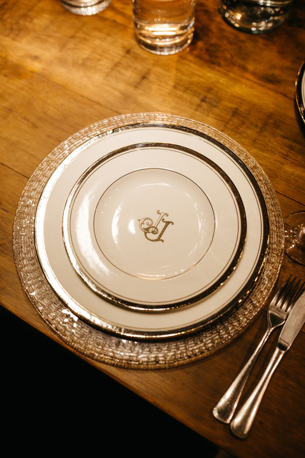 A table setting with silverware and plates · Free Stock Photo