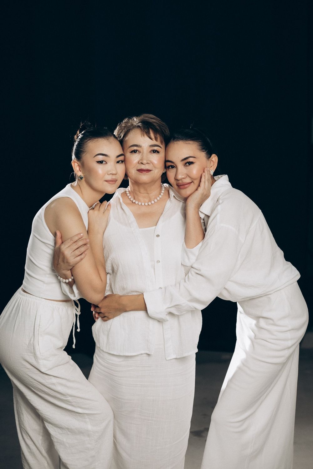 Three women in white posing for a photo · Free Stock Photo