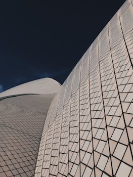 Detailed view of Sydney Opera House's modern architecture in daylight.