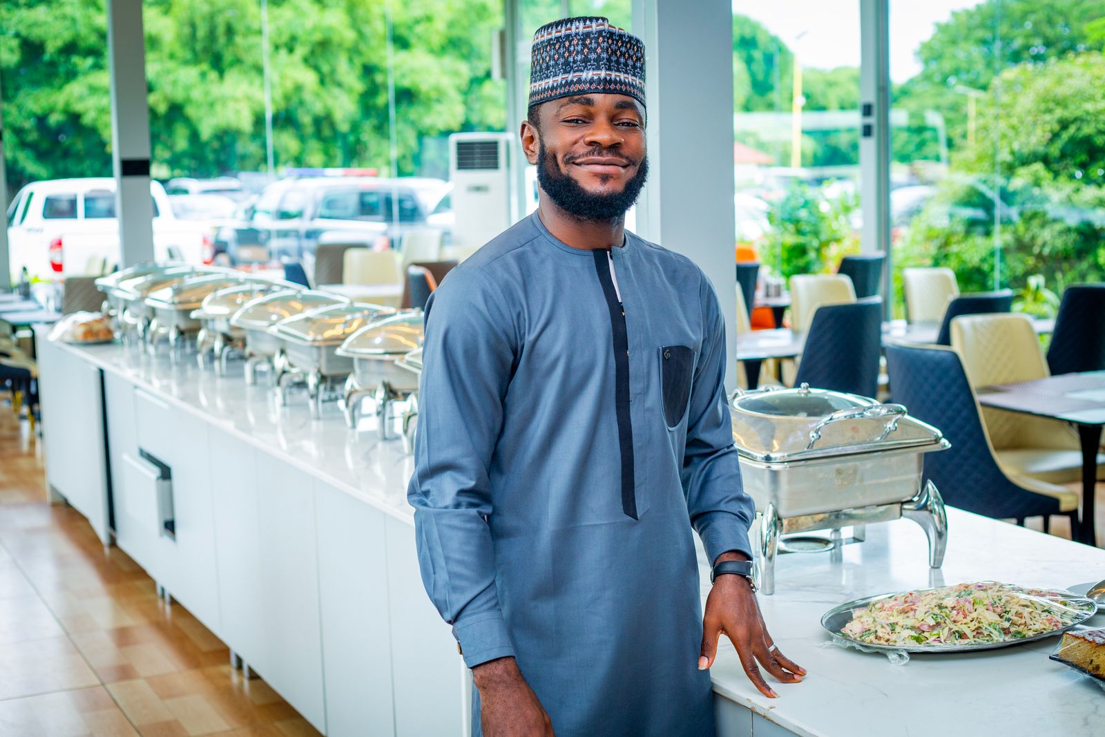 African chef in a modern restaurant environment