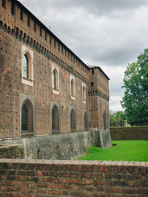 Free Ancient brick fortress with arched windows, Milano, Italy Stock Photo