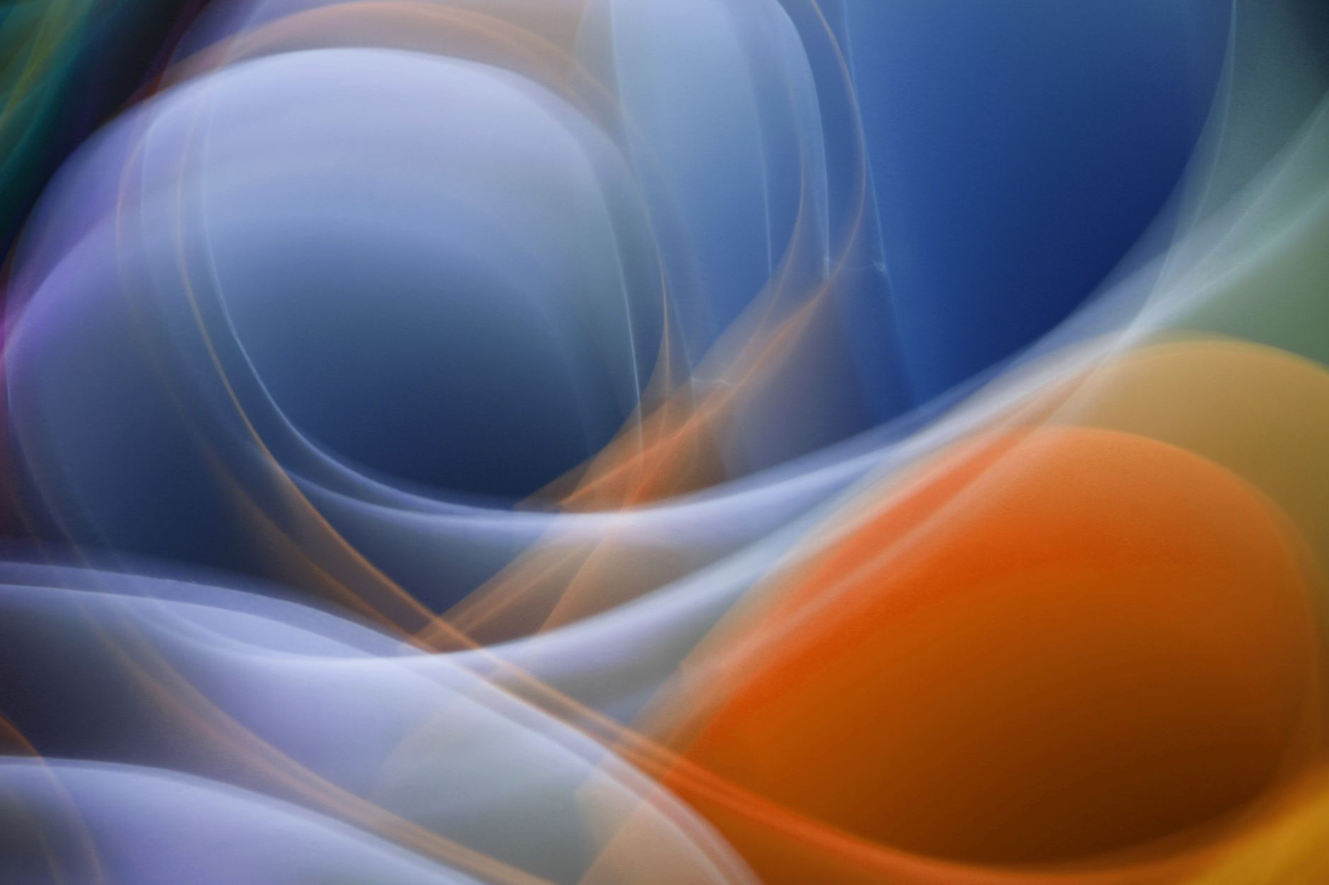 Vibrant abstract artwork featuring flowing colorful curves and gradients.