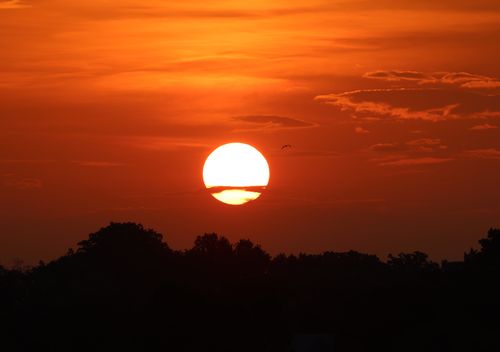 Free Captivating sunset view with warm hues over Stamford, CT. Perfect for nature and travel themes. Stock Photo
