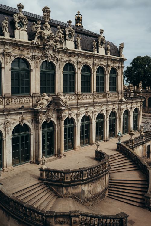 Free Elegant baroque architecture of Zwinger Palace in Dresden, featuring intricate facades and grand staircases. Stock Photo