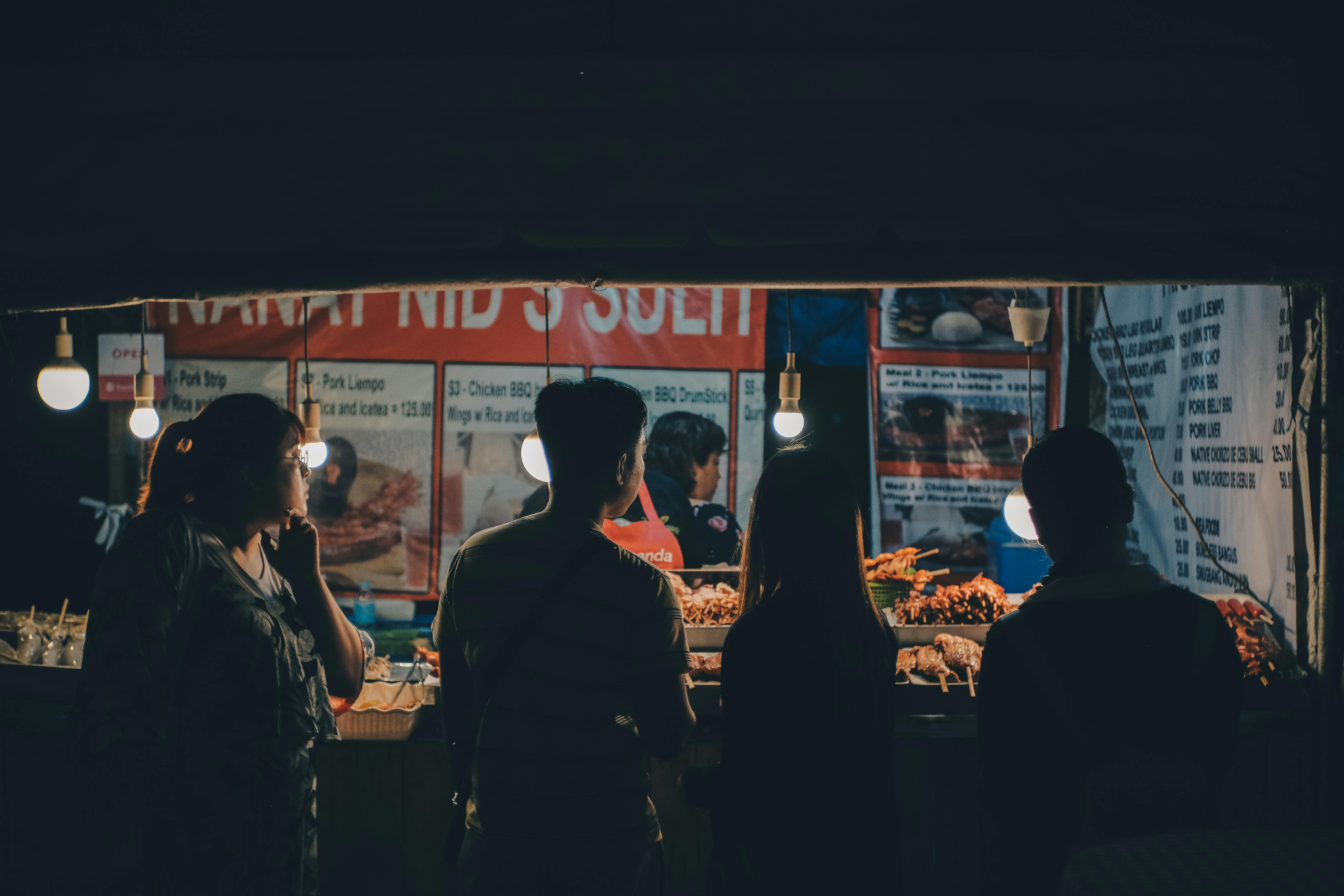 Larsian BBQ grilled meat skewers at night market Cebu Philippines