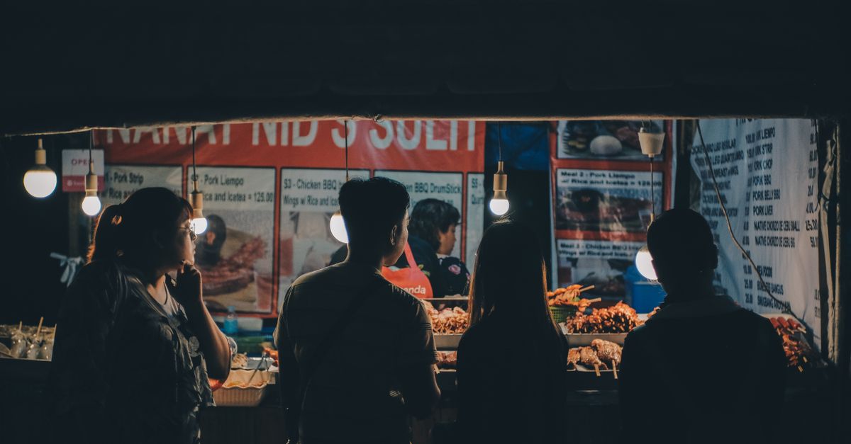 Larsian BBQ grilled meat skewers at night market Cebu Philippines