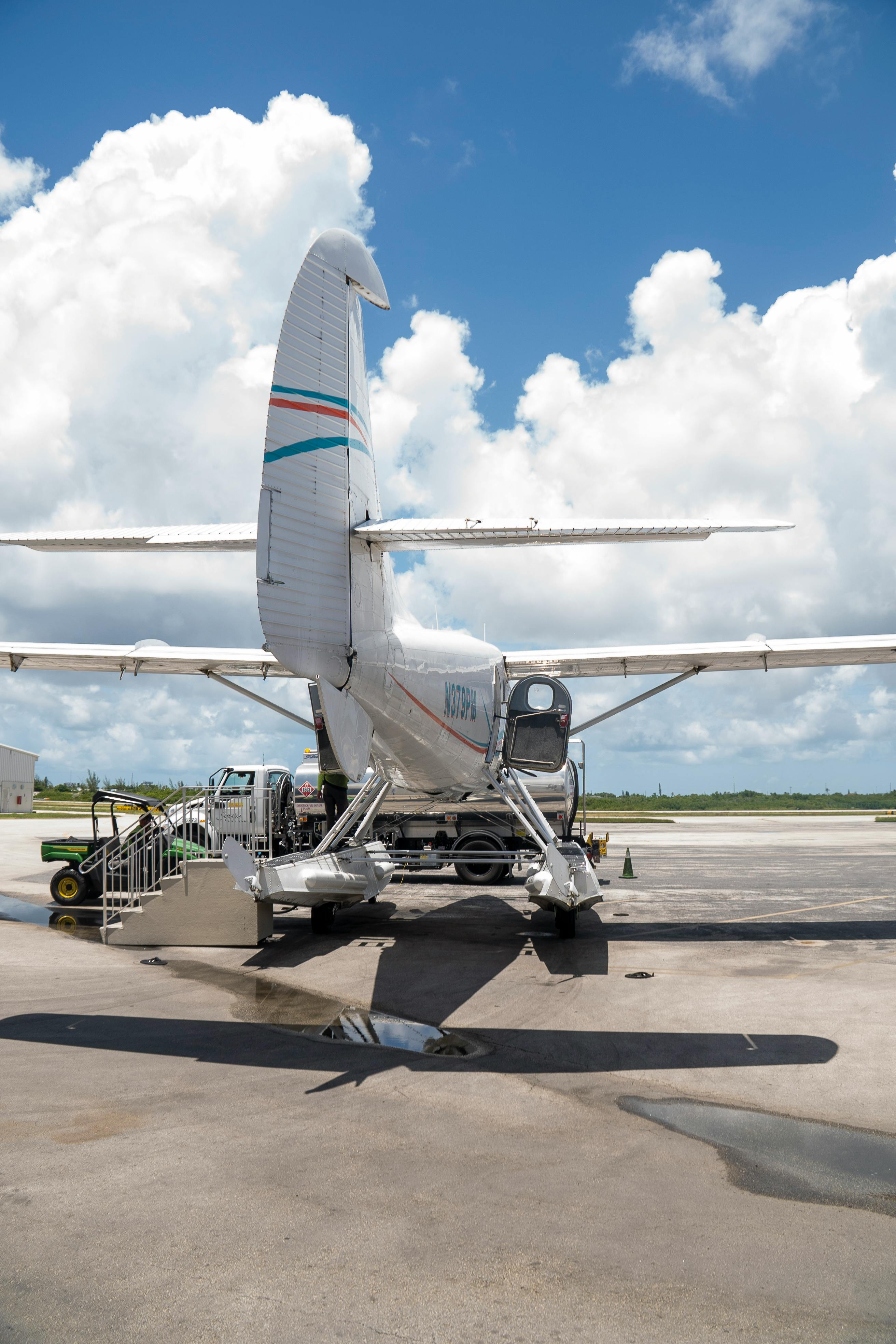 Cessna aircraft parked at Key West airport on a bright sunny day with clear skies.
