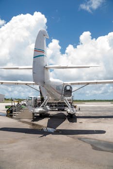 Cessna aircraft parked at Key West airport on a bright sunny day with clear skies.