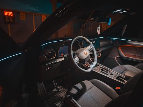 Explore this sleek car interior featuring ambient lighting and digital dashboard.