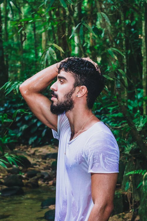 Free Photo Of Man Touching His Head Stock Photo