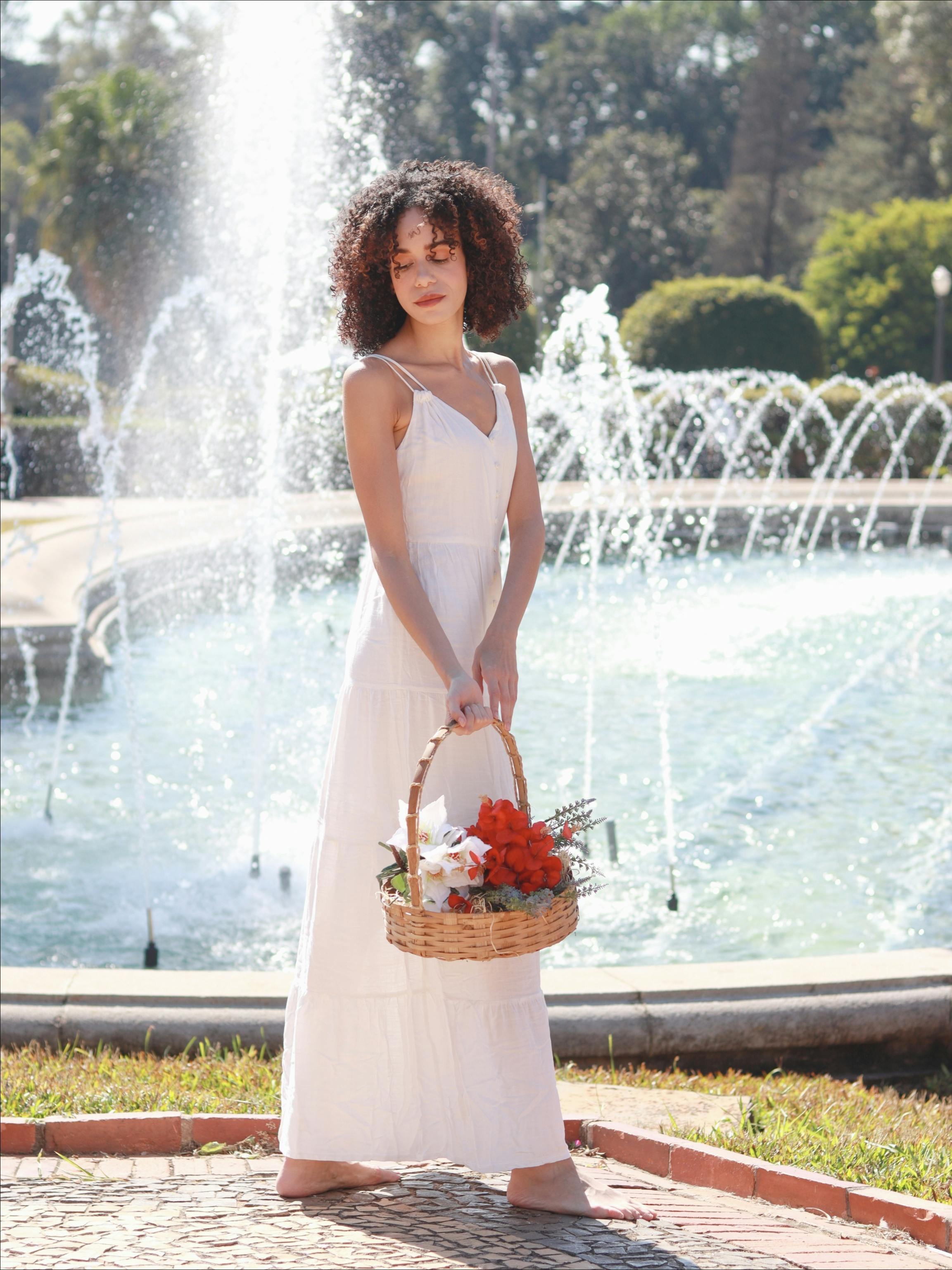 bride in front of a fountain