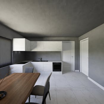 Sleek minimalist kitchen with gray tones and wooden accents in Cluj-Napoca.