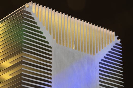 Detailed view of a metallic heat sink showcasing technological design.