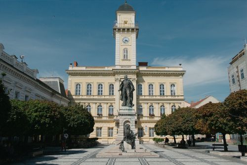 Free Stunning view of historic building and statue in Komárno, Slovakia, embodying classic architecture. Stock Photo