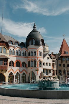 Breathtaking view of unique architecture in Komárno, Slovakia with a picturesque fountain.