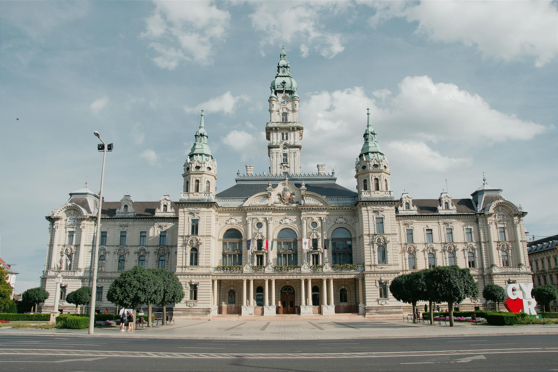 A large building with a clock tower and a clock