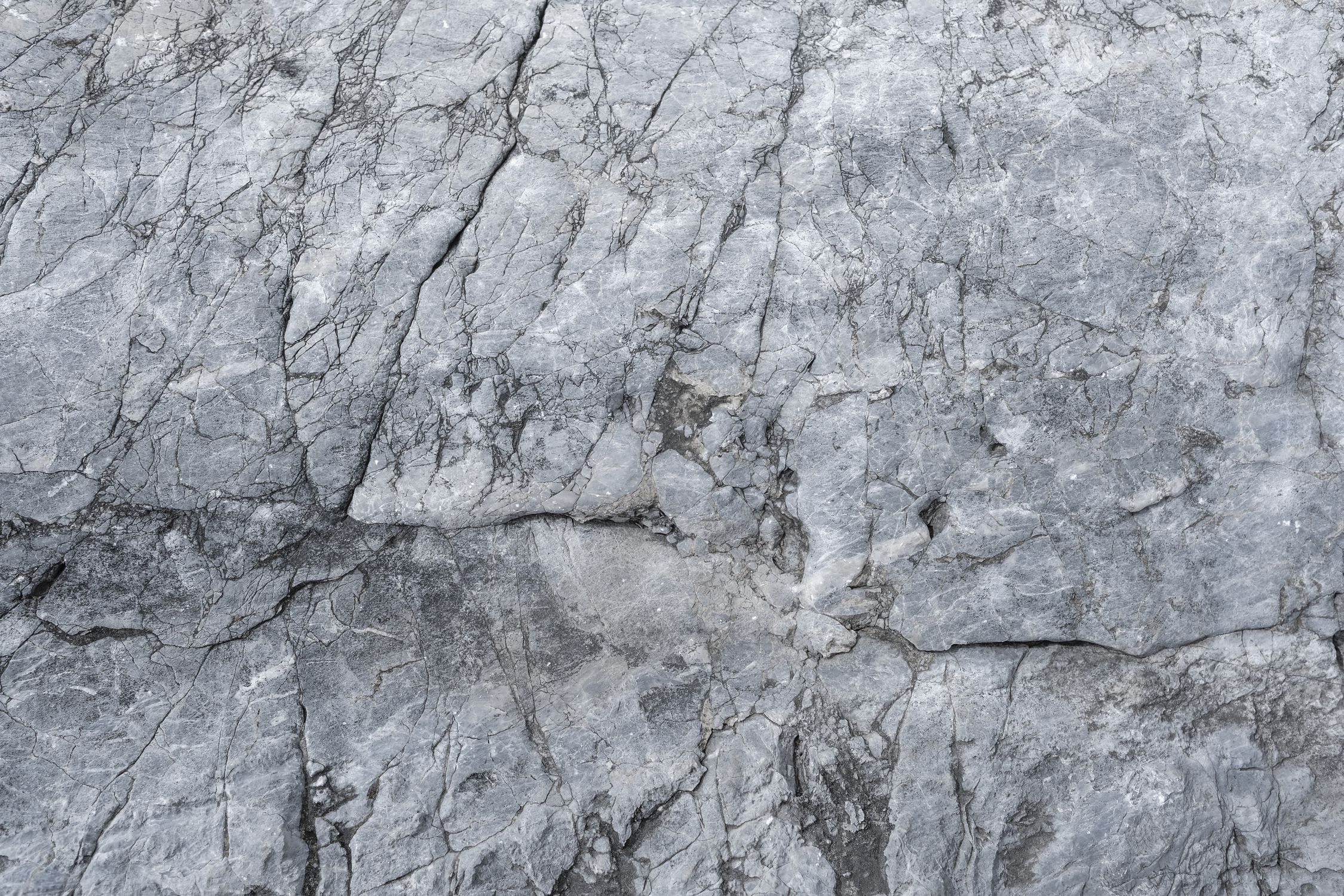 Grey Spotted Rocks A gray rock texture with some white spots · Free Stock Photo
