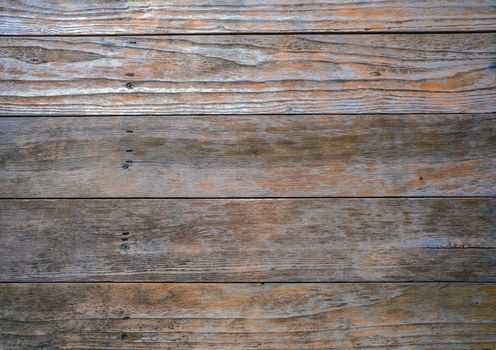 Detailed view of textured rustic wooden planks with a vintage feel.
