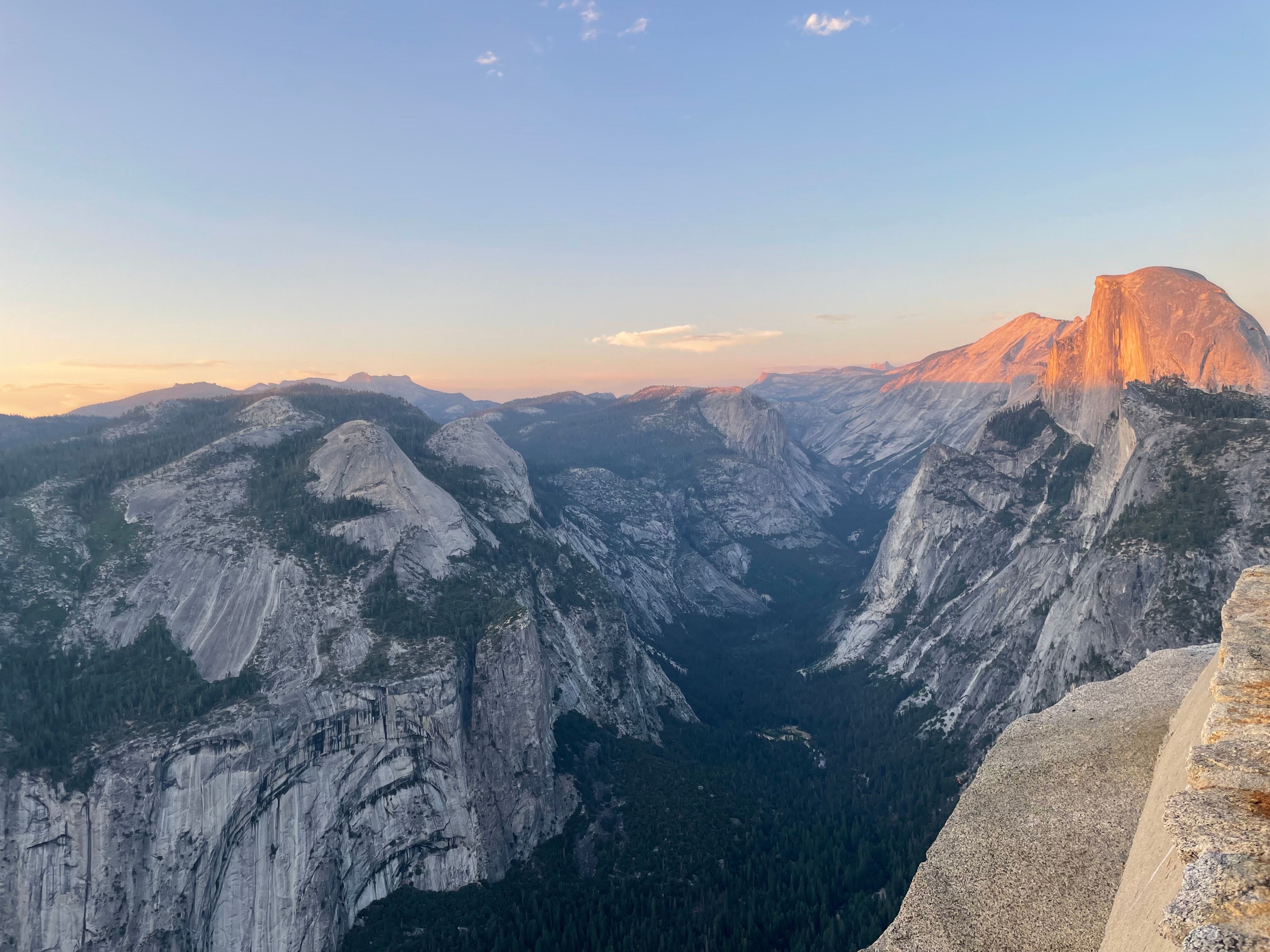 The sun sets over half dome in yosemite national park · Free Stock Photo