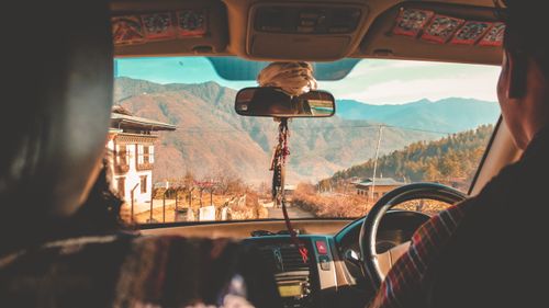 Free Capturing a picturesque road journey through Bhutan's mountainous landscape. Stock Photo