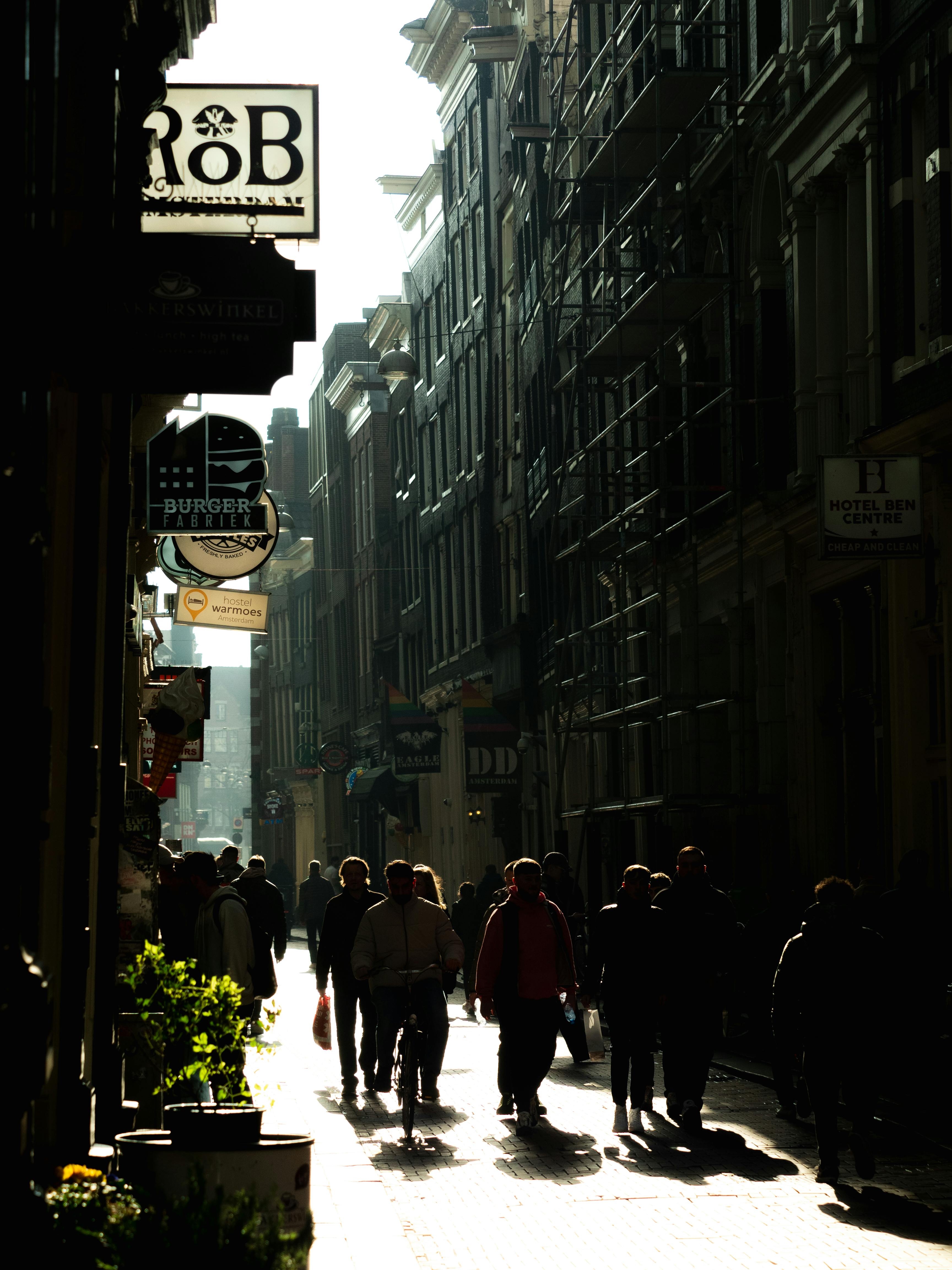 a group of people walking down a street