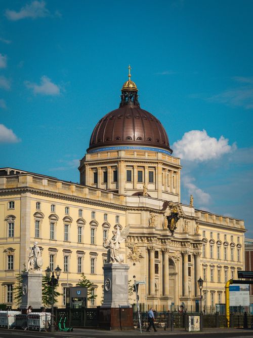 Free Stunning baroque architecture with a grand dome under a clear blue sky. Stock Photo