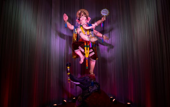 Vibrant Ganesh statue displayed during Ganesh Chaturthi festival in Mumbai, India.