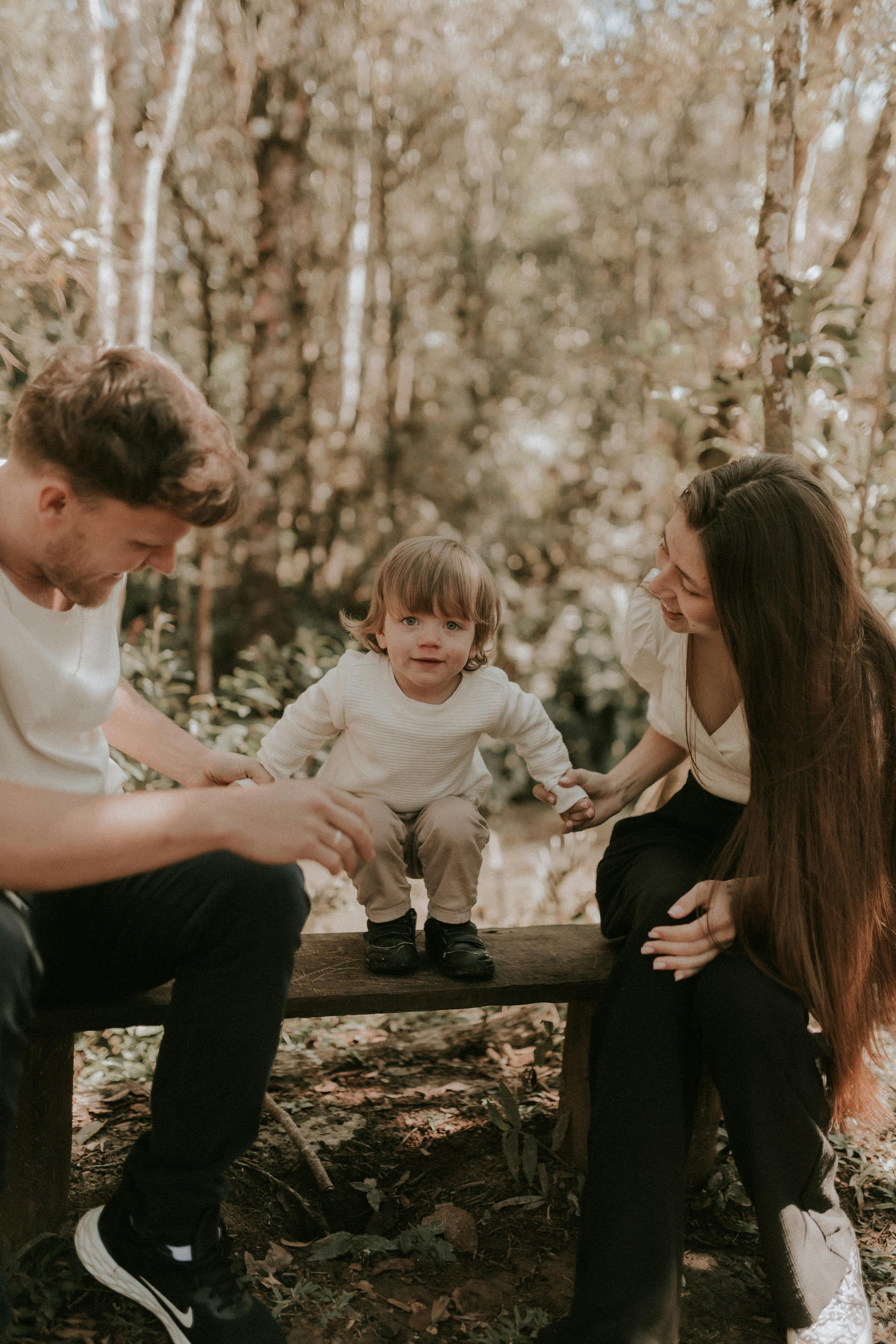 smiling couple with their son