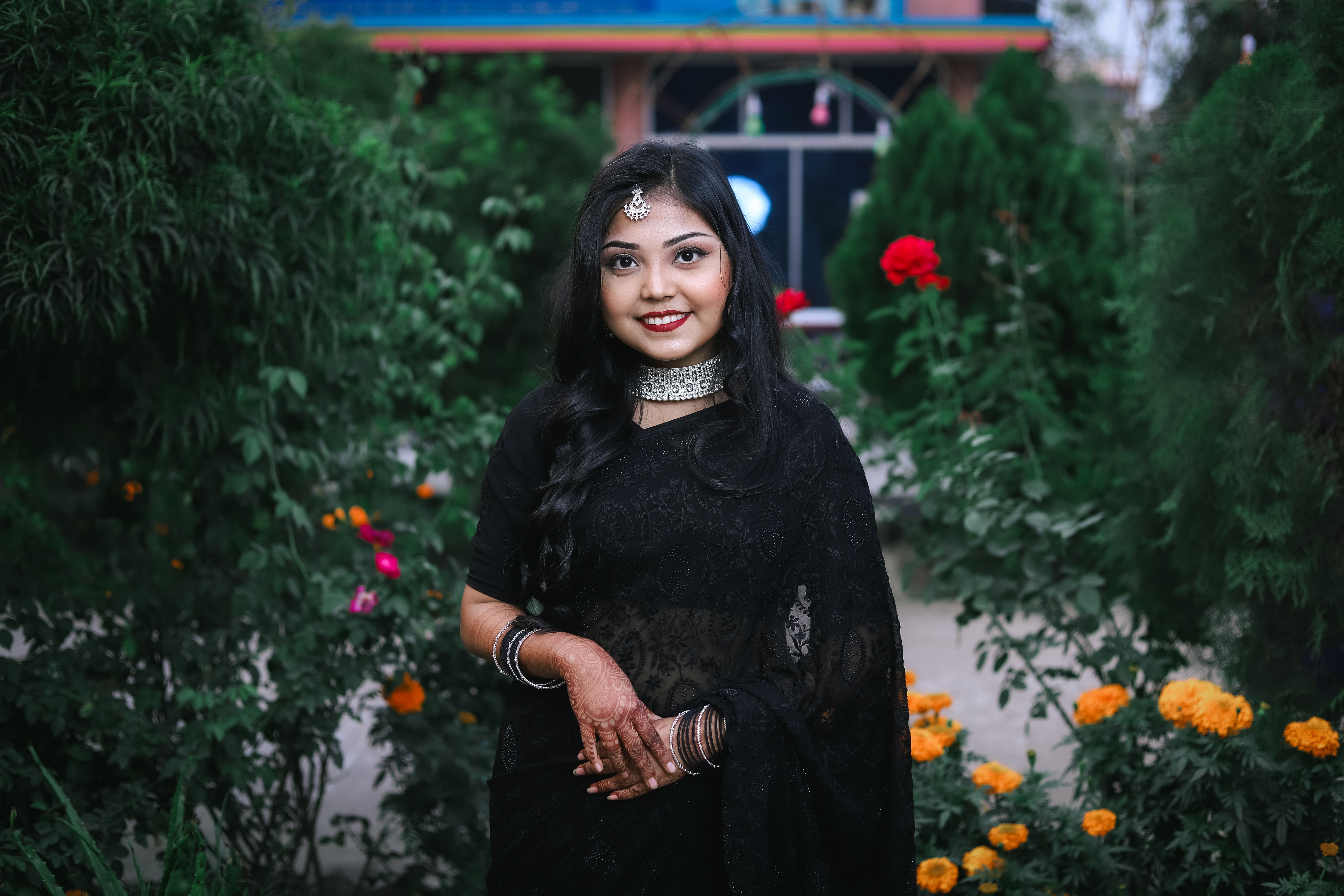 A young girl in a sari with her hair blowing in the wind · Free Stock Photo