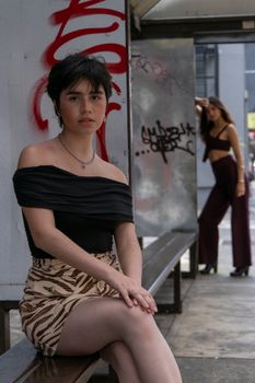 Stylish portraits of women surrounded by urban graffiti in San José, Costa Rica.